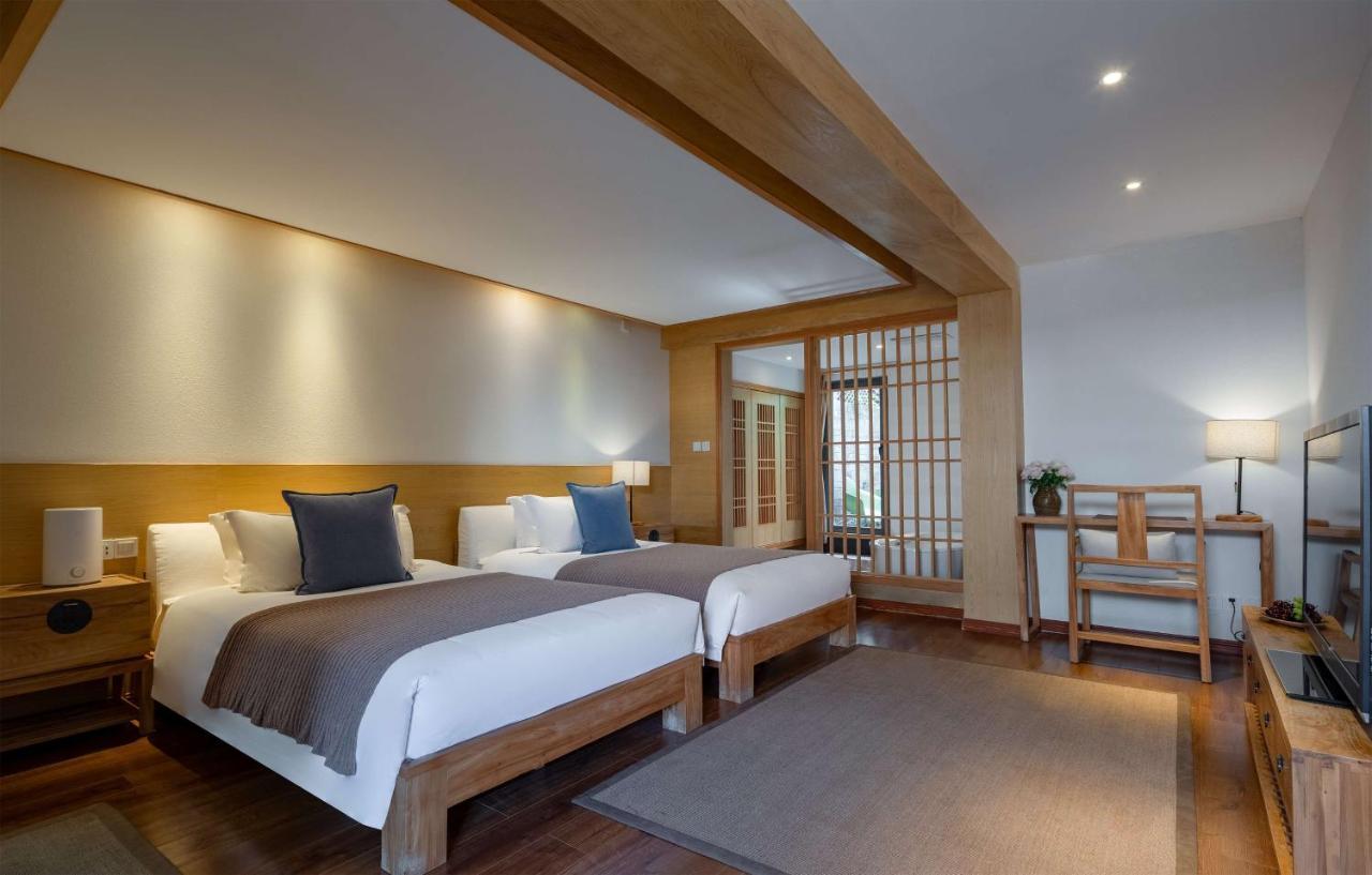Lijiang Sunshine Nali Inn ภายนอก รูปภาพ