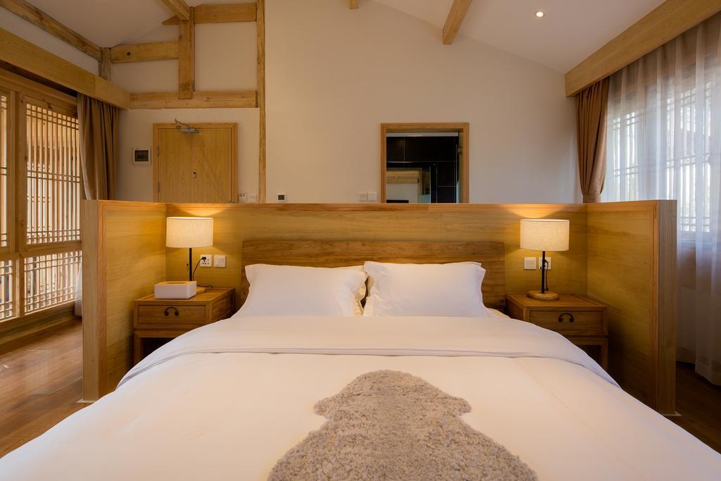 Lijiang Sunshine Nali Inn ภายนอก รูปภาพ