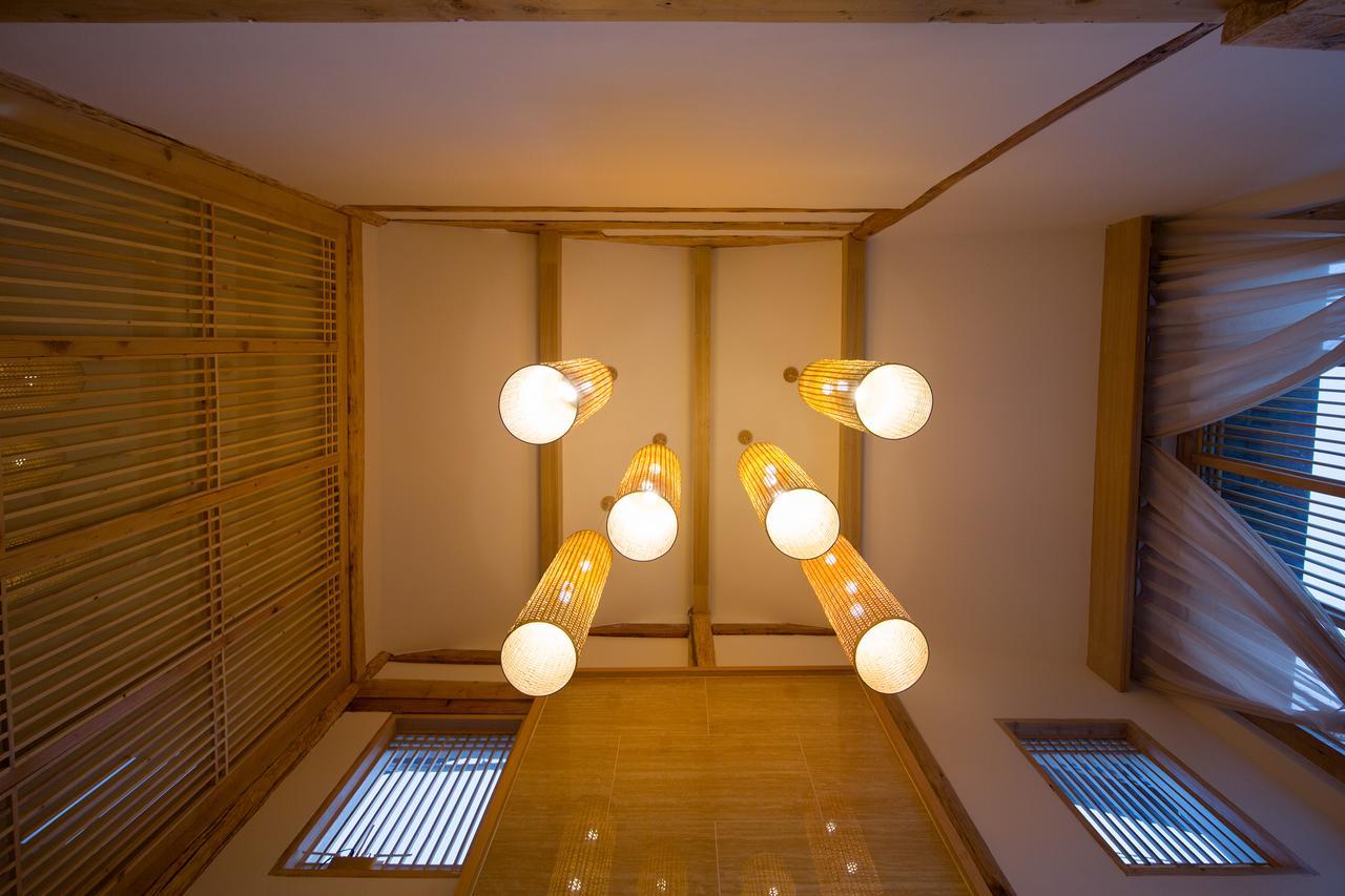 Lijiang Sunshine Nali Inn ภายนอก รูปภาพ